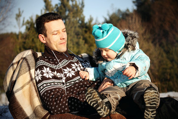 dad baby happy outside winter snow © yuriy