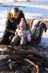 mom baby happy outside winter snow © yuriy