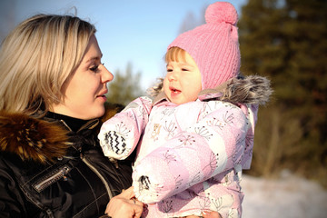 mom baby happy outside winter snow © yuriy