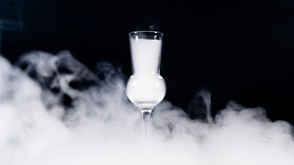 schnaps glass full of smoke, shot glas filled with smoke