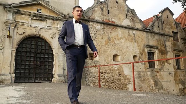 A man in a jacket in the castle