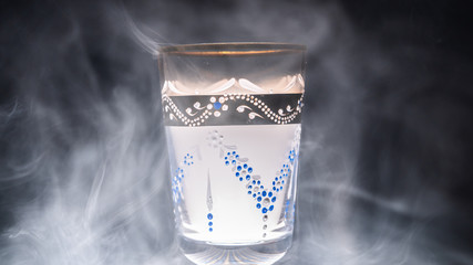 goblet glass full of smoke, goblet glas filled with smoke, smoke inside a glas