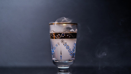 goblet glass full of smoke, goblet glas filled with smoke, smoke inside a glas