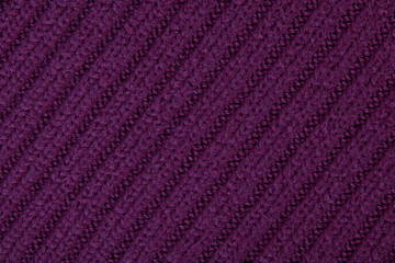Background made with burgundy wool cloth. Fabric texture