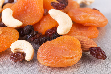 Apricots, raisins, cashew, almonds. Dried fruits and nuts Close up angle view