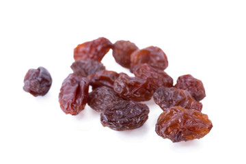 Black raisins dried sweet grapes isolated on white background