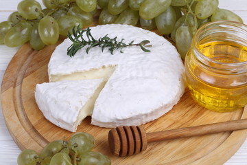 Camembert with honey and grapes
