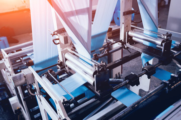 Modern automated production line in factory. Plastic bag manufacturing process