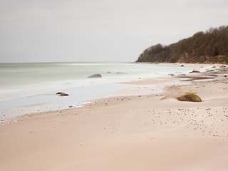 Desert sand with  shapes from crushed shells and sediments