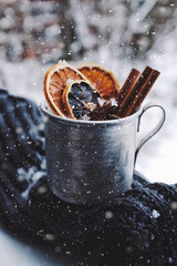 Set of spices for mulled wine in vintage mug in snowflakes - 233939849