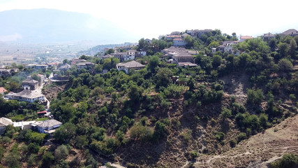 Fototapeta na wymiar View over the rooftops of the city of Gjirokastra, Albania, beautiful cityscape