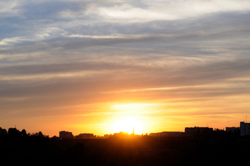 Magical view of gorgeous sunset over cityscape