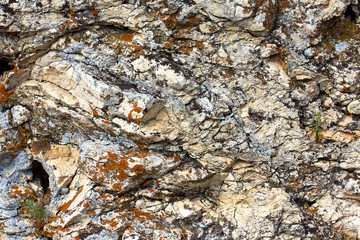 The texture of the stone close-up with streaks.