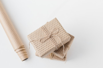 Wrapped christmas presents on textured white background