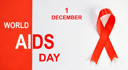 Red ribbon on white background. World Aids Day concept