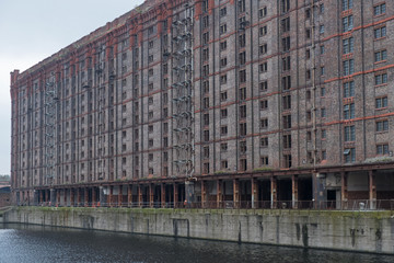 Derelict Victorian warehouse at the disused Stanley Dock on the Liverpool waterfront UK