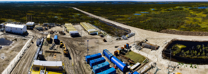 construction site of a drilling rig on a bog top view