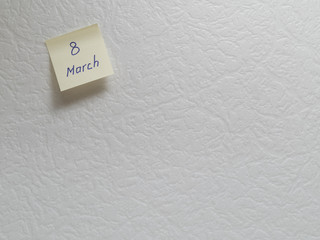 March 8, calendar date sticky note