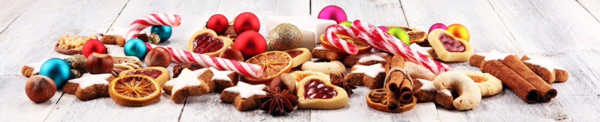 Decoration with christmas cookies. Typical cinnamon stars with fruits and nuts