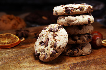 Chocolate cookies on wooden table. Chocolate chip cookies shot