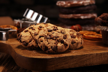 Chocolate cookies on wooden table. Chocolate chip cookies shot