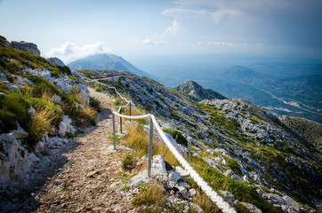 Mountain path on top of peak Sveti Jure, Biokovo, Dalmatia, Croatia - obrazy, fototapety, plakaty