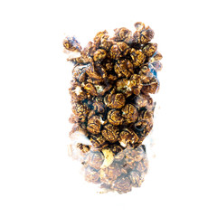 Chocolate covered popcorn in a clear plastic bag.