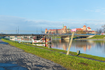 View of the Wawel castle and the Grunwald bridge in Cracow, Poland