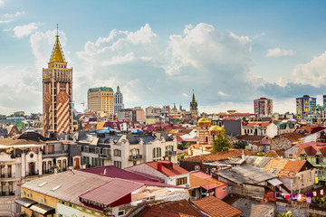 Fototapeta na wymiar top view of the main attractions of old Batumi, located on the Black sea coast on a cloudy summer day. The Church of St. Nicholas, Basilica, Capital tower, Cathedral of the Nativity of virgin Mary