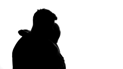 Girlfriend hugging her boyfriend, trustful relations, loving spouse support