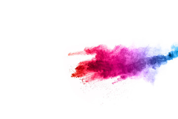 abstract powder splatted background. Colorful powder explosion on white background. Colored cloud. Colorful dust explode. Paint Holi.