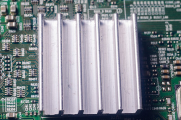 A thick layer of dust covers the internal electronic components of the computer
