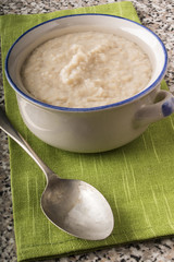 creamy porridge made with traditional irish oatmeal in a bowl