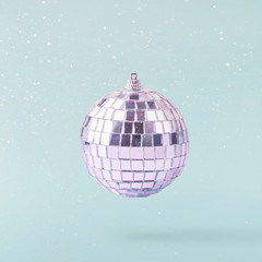 Christmas concept.  Creative Christmas conception made by falling in air shiny disco ball