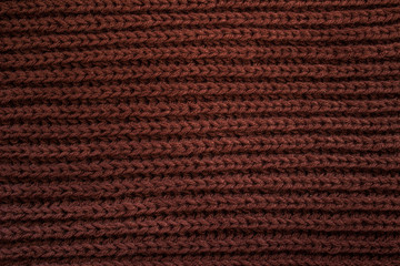knitted handmade brown background texture 
