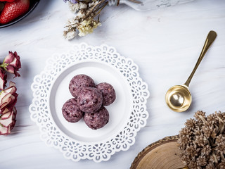 Healthy organic date energy balls with berry, dried fruits and nuts. Food for healthy lifestyle.