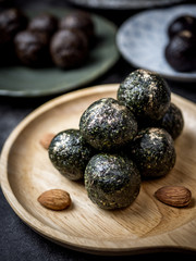 Healthy organic date energy balls with green tea, dried fruits and nuts. Food for healthy lifestyle.