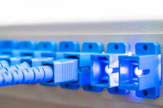 Several empty ports with a powerful signal on the Optical Fiber Distribution Frame. Concept of high-speed Internet connection