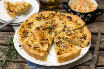 Savoury pie tart with minced meat, cabbage and cheese
