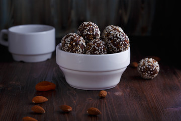 healthy energy balls with nuts, dates, honey and sesame