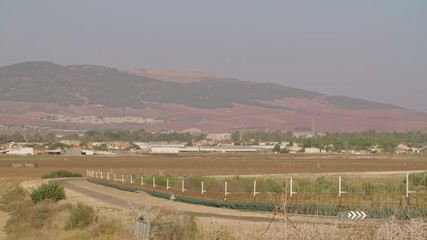 Border fence between Israel and West Bank. barbed wire electronic fence.