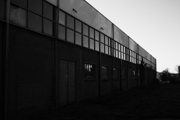 outside of a warehous black en white