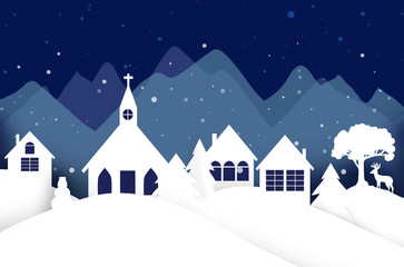 Christmas village scene with Church steeple and mountains in the background, beautiful holiday landscape with snow falling on white cut-out houses with deer, trees and snowman
