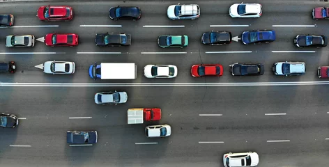 Foto op Plexiglas City traffic jam on a highway. Aerial. © Dmytro