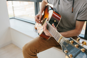 Learning to play the guitar. Music education and extracurricular lessons. Hobbies and enthusiasm for playing guitar and singing songs. To have fun.