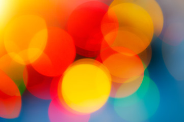 Abstract defocused festive background, red color spots.