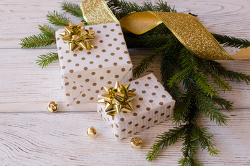 Gifts for the New year and Christmas on the wooden background