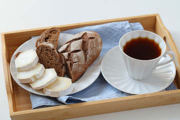 Breakfast with goat cheese and coffee