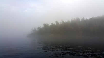 Obraz na płótnie Canvas Island in a fog.