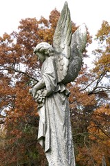 tombstones with angels and figures in victorian graveyard